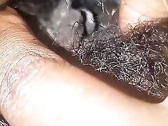 Rubbing her wet tight pussy