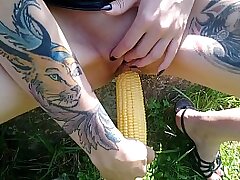 Lucy Ravenblood fucking pussy with corn in public
