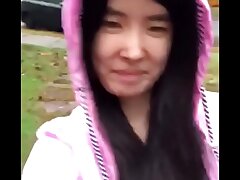 Asian Nubile publicly unveils herself in the rain!