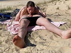 Naturist couple lovin? blow-job at the beach