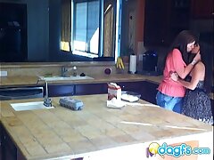 Horny cougar eats teenager pussy in the kitchen