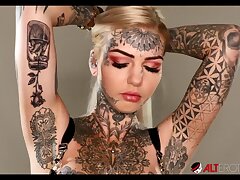 Gorgeous busty Australian honey has her tits tatted