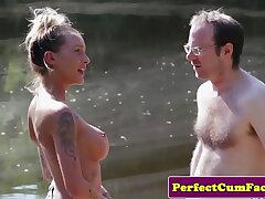 Big-titted female dom wanking guy outdoors for spunk