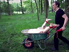 Encaged big-chested sub endures obedience