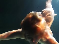 Babes swim and get bare underwater