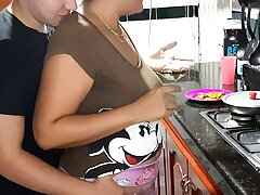 My step-mother gives me a prosperous oral job in the kitchen.
