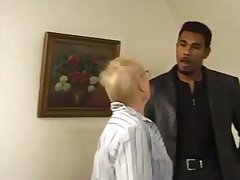 Grandma with dark-hued cock