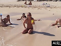 Six Mischievous Lesbians Go At It On A Public Beach