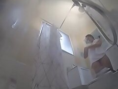 Natalia gets caught soaping her Phat TITS in the bathroom