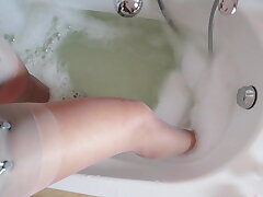 the marionette mega-bitch of ebony cocks, takes a bath in stockings2