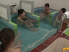 Chinese babes take a bathroom and get fingered by a freak stud