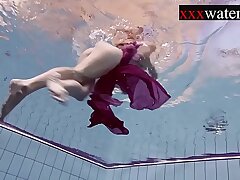 Smoking super-steamy Russian redhead in the pool