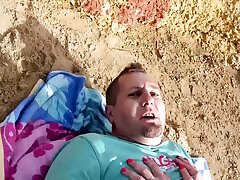 Excellent looking German blonde pleasuring a loaded sausage outdoors