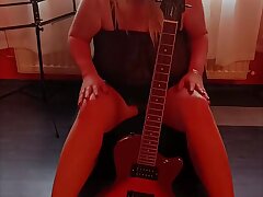 Boobies Next to the Guitar